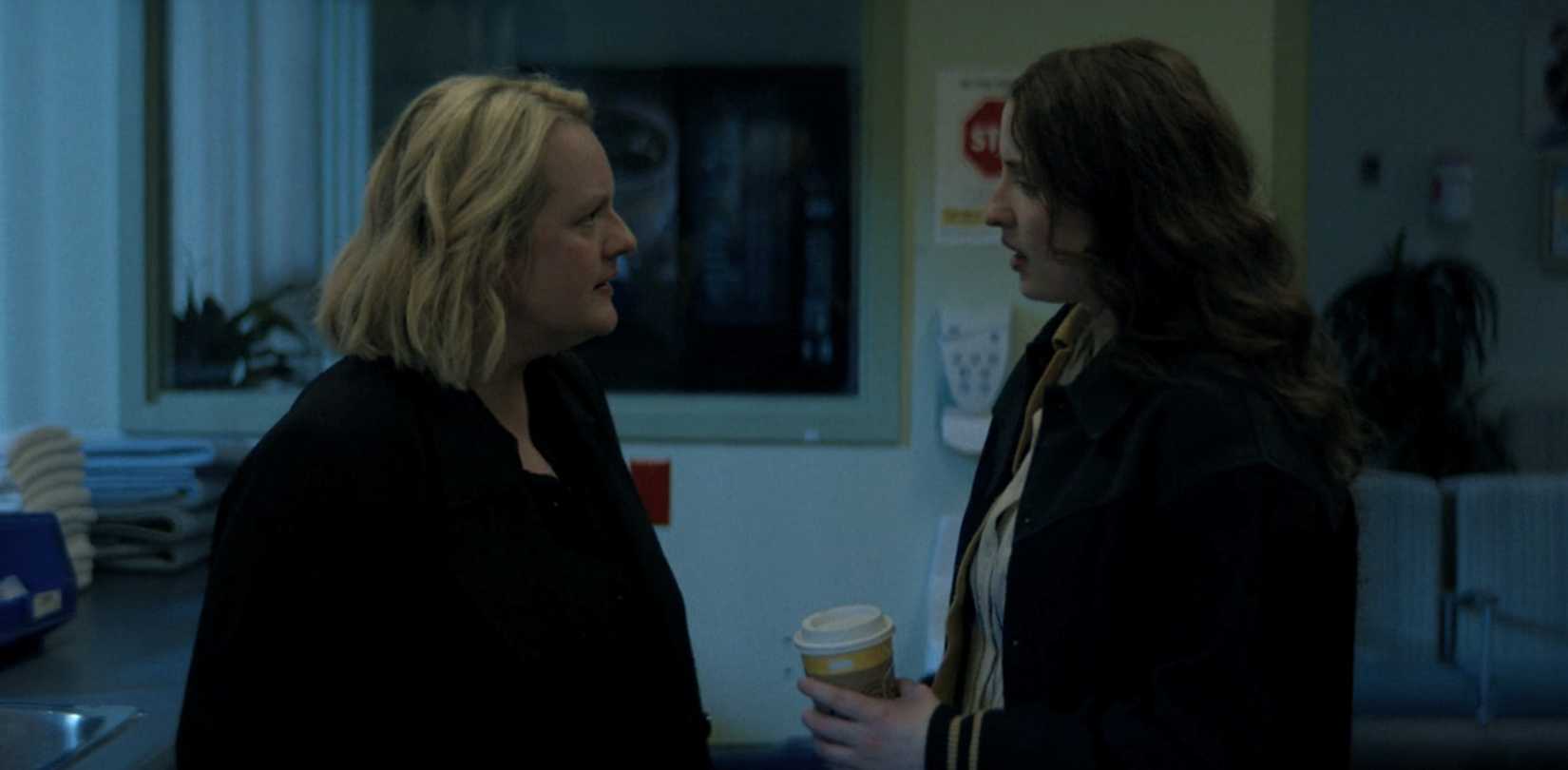 June (Elizabeth Moss) argues with Daisy ((Lucy Halliday) in a hospital room in The Testaments