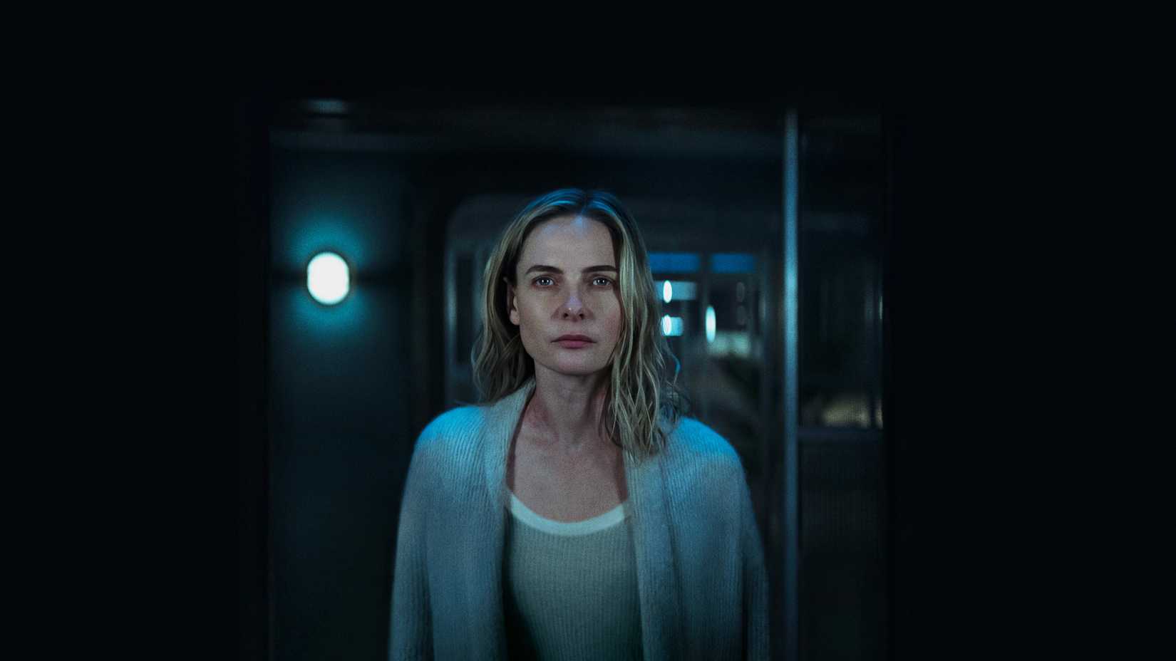 Juliette Nichols (Rebecca Ferguson) jooks forward intently in Silo.