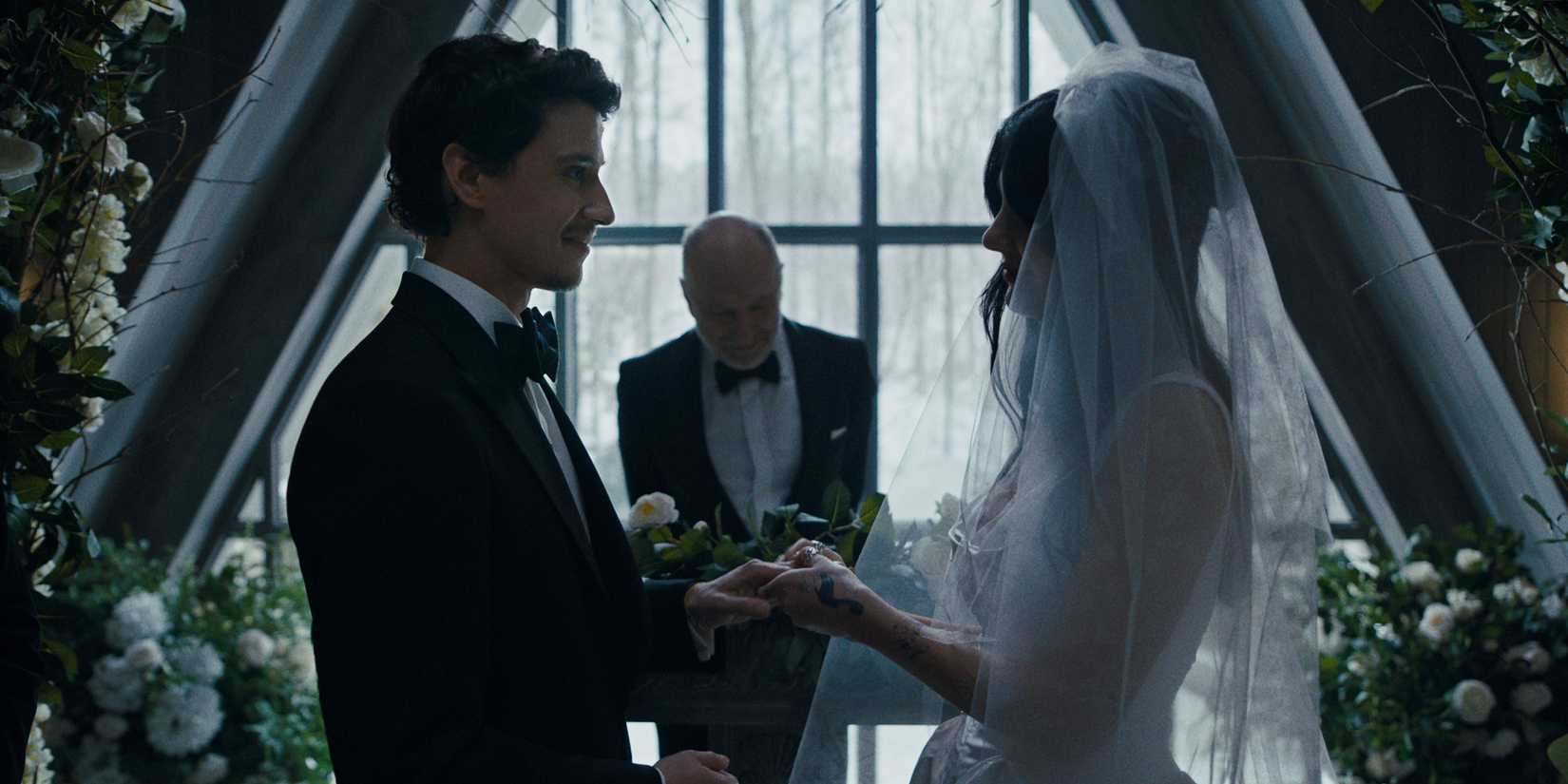 Something Very Bad Is Going To Happen from Netflix. It shows a man and a woman, the man dressed in a tux and the woman in a white wedding dress.