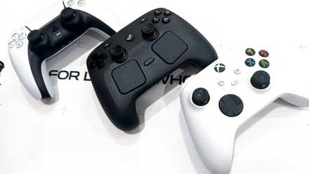 A Steam Controller sits with a DualSense and an Xbox Wireless Controller.