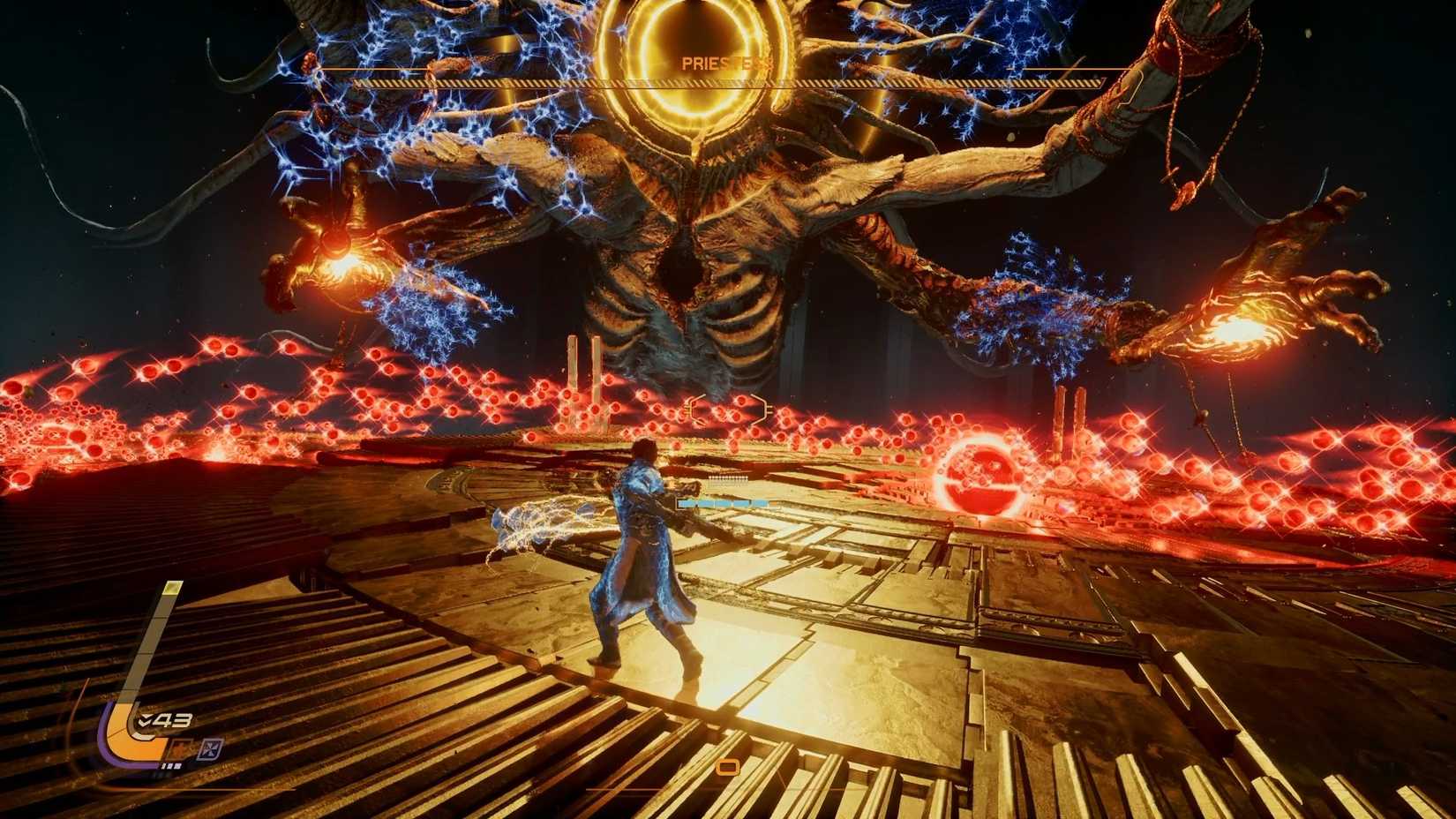 The Priestess throwing four groups of homing blue projectiles at the player in Saros.