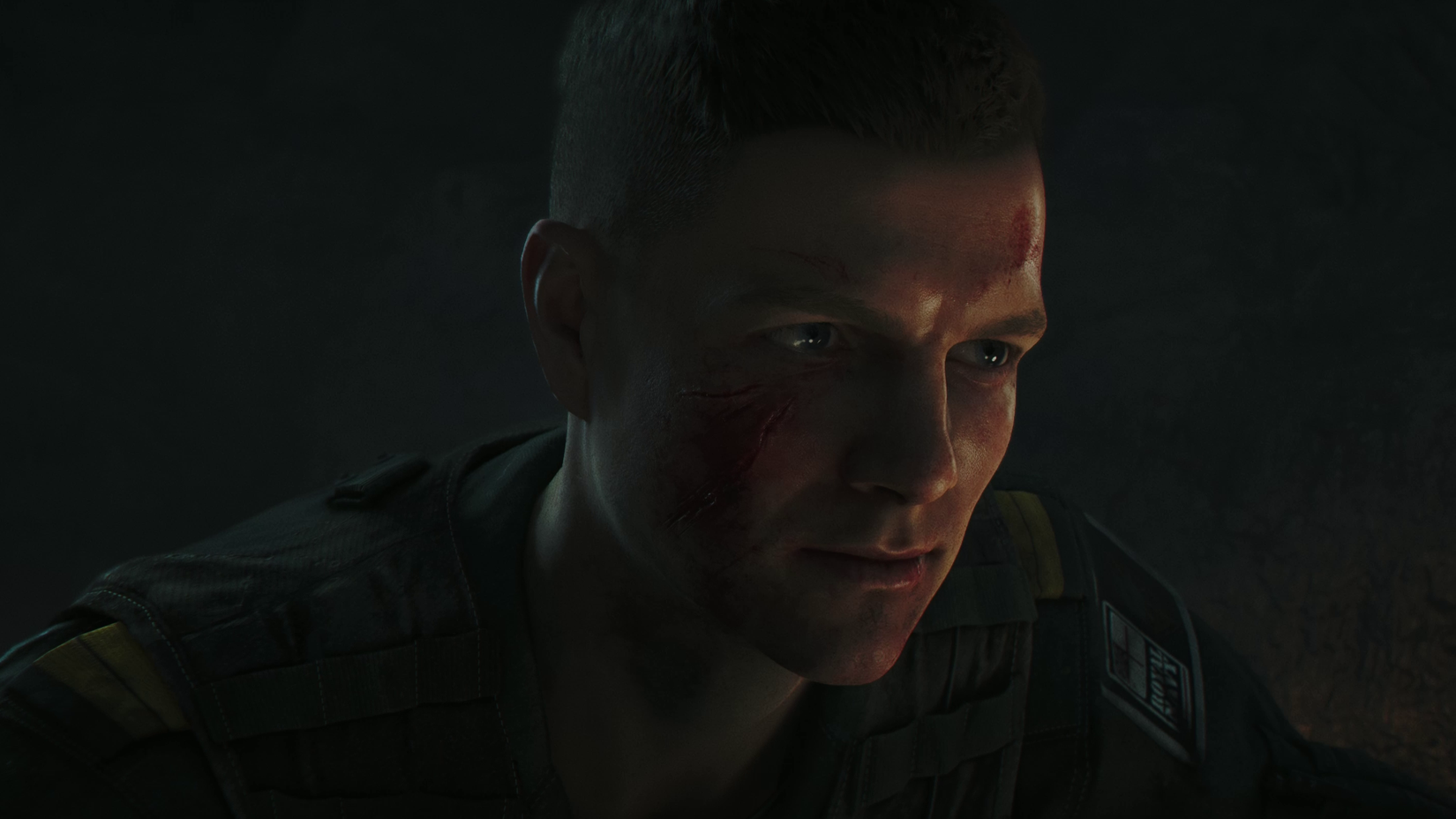 A very young James Bond in naval fatigues in low lighting