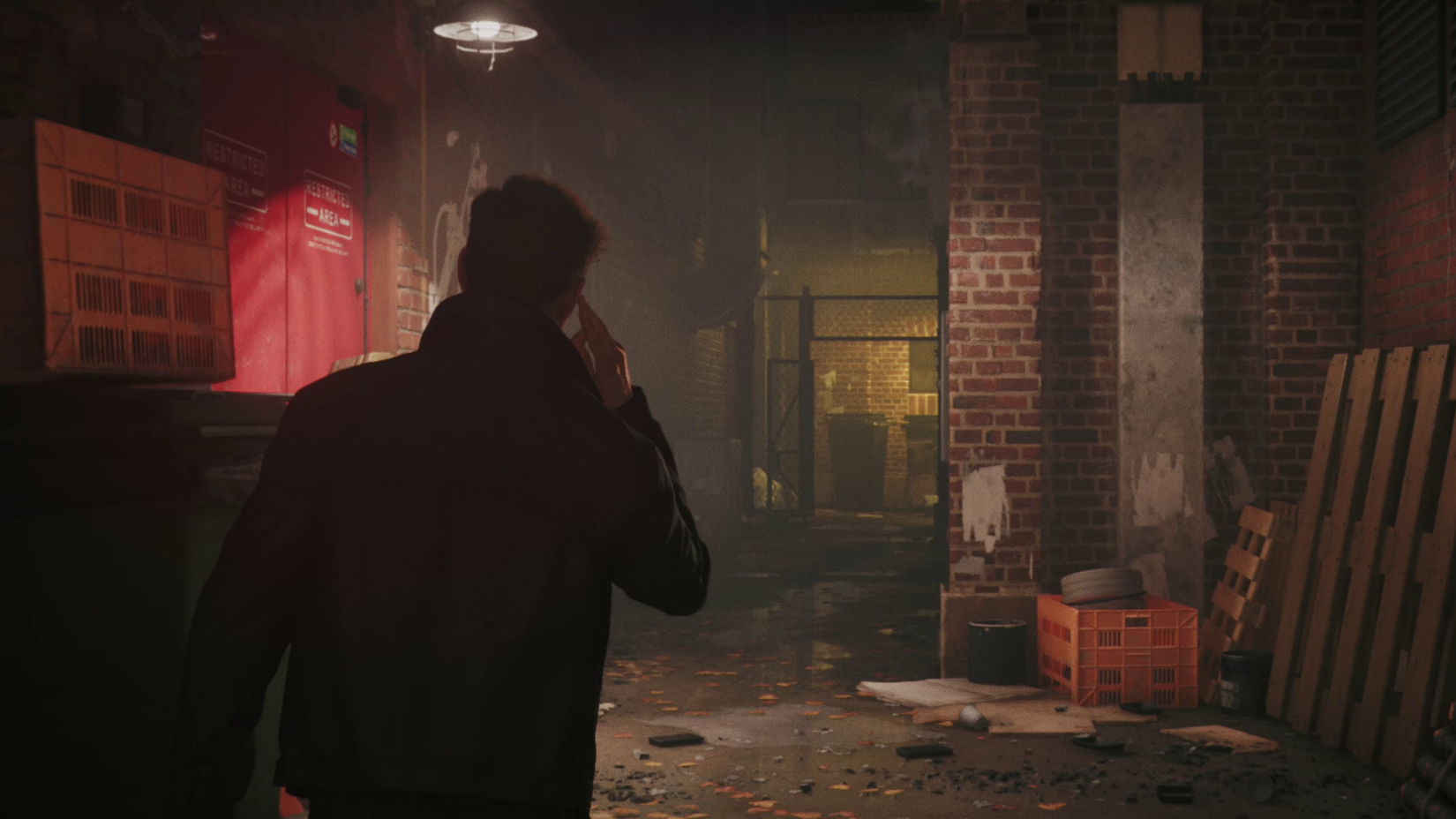 James Bond, finger to his ear, explores a dark alleyway