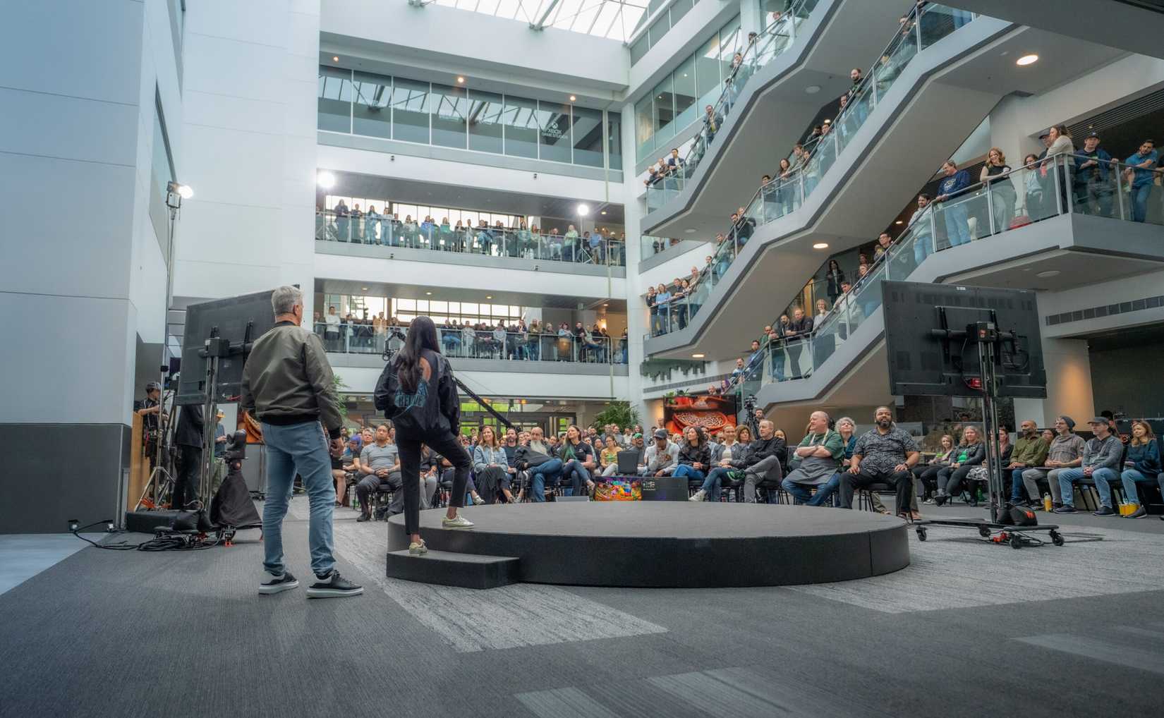 Asha Sharma and Matt Booty talk to the Xbox staff