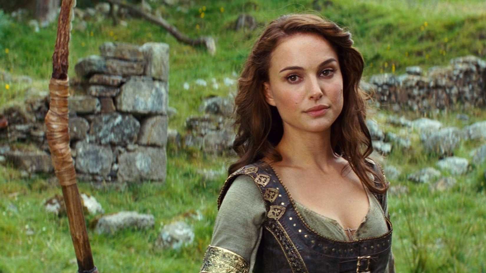 Natalie Portman, as the warrior princess Isabel, looks at the camera holding her bow and arrow in a scene from the 2011 fantasy-comedy Your Highness.