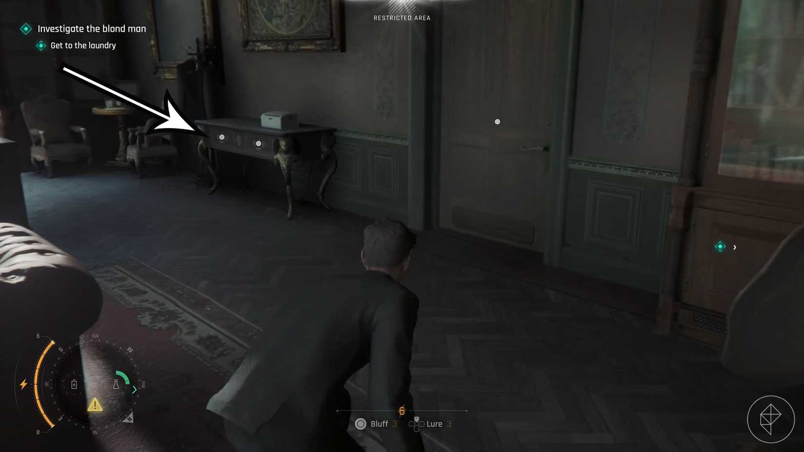A 007 First Light screenshot showing where you can find the first clue to open the safe in the Slovakia hotel