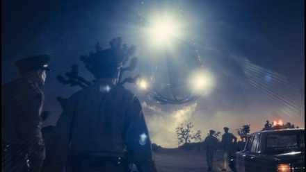 Disclosure Day - an unidentified flying object in the sky as police look on