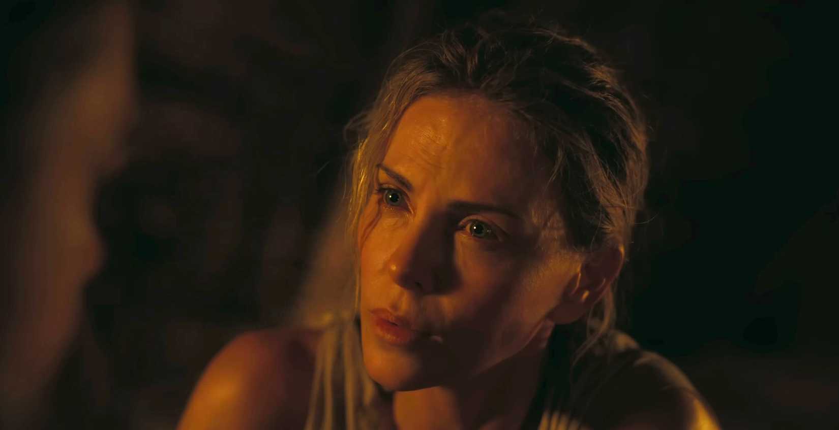 Charlize Theron as Circe whispers to Odysseus in The Odyssey