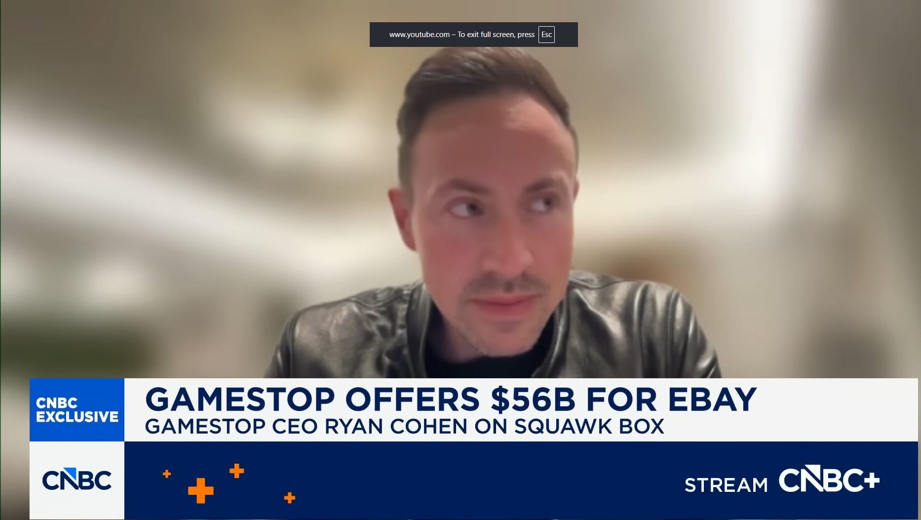 GameStop CEO Ryan Cohen looks to the side as he answers questions on his proposed acquisition of eBay during an interview.