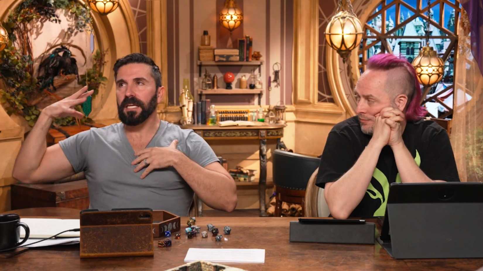 Image from Critical Role showing Luis Carazo speaking alongside Taliesin Jaffe.