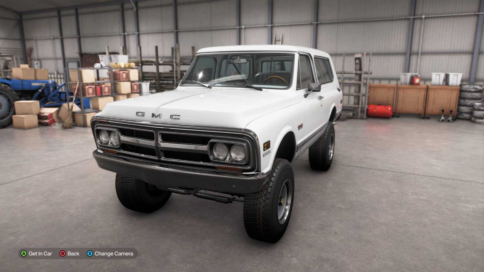The GMC Jimmy in the garage in Forza Horizon 6.