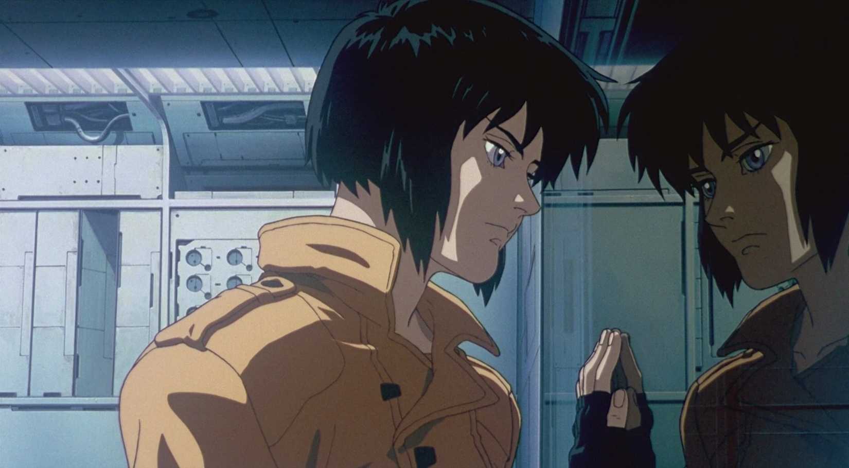 A young cybernetic woman (Matoko) peers at her own reflection in Ghost in the Shell