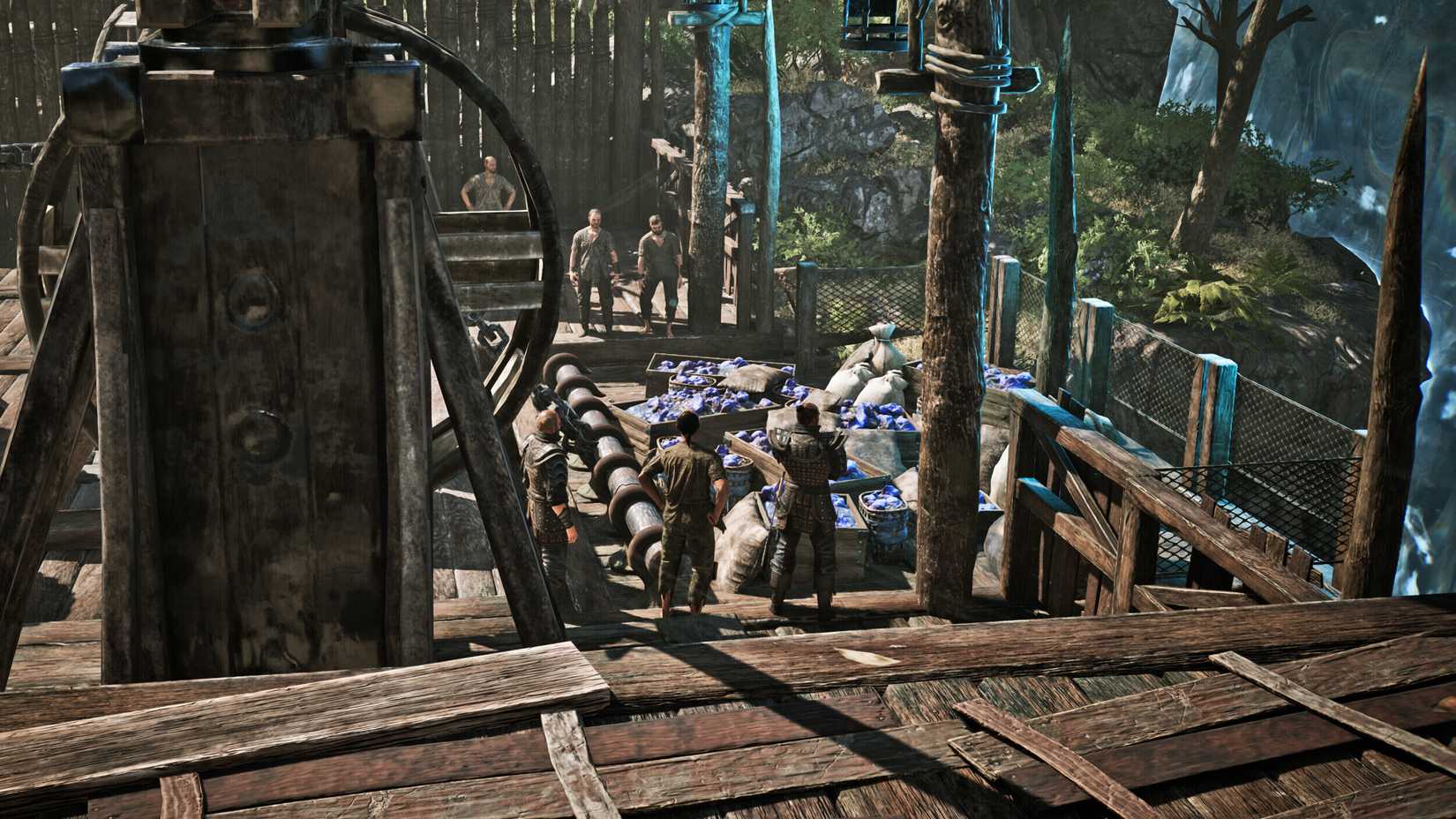 Miners stand around a few crates full of ore in Gothic 1 Remake.