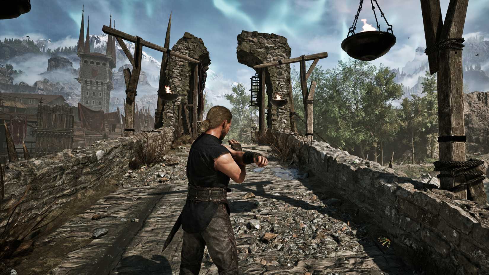 The Nameless Hero stands on a bridge in Gothic 1 Remake.