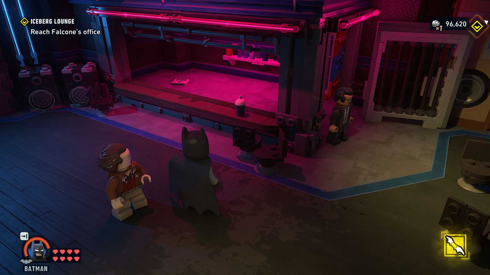  Legacy of the Dark Knight screenshot showing Batman looking inside the bar in the V.I.P. area of the Iceberg Lounge