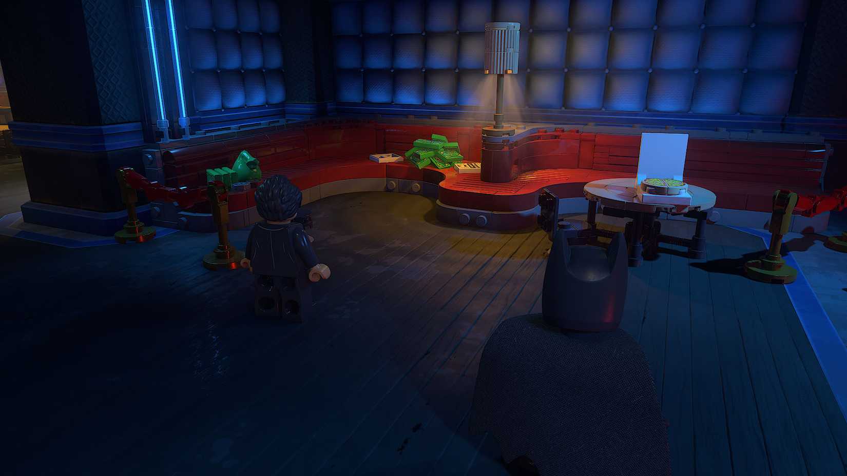  Legacy of the Dark Knight screenshot showing Batman looking at red sofas
