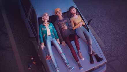 Three teens lying on the hood of a car