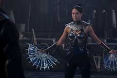 Kitana (Adeline Rudolph) displays her fan weapons in Mortal Kombat 2