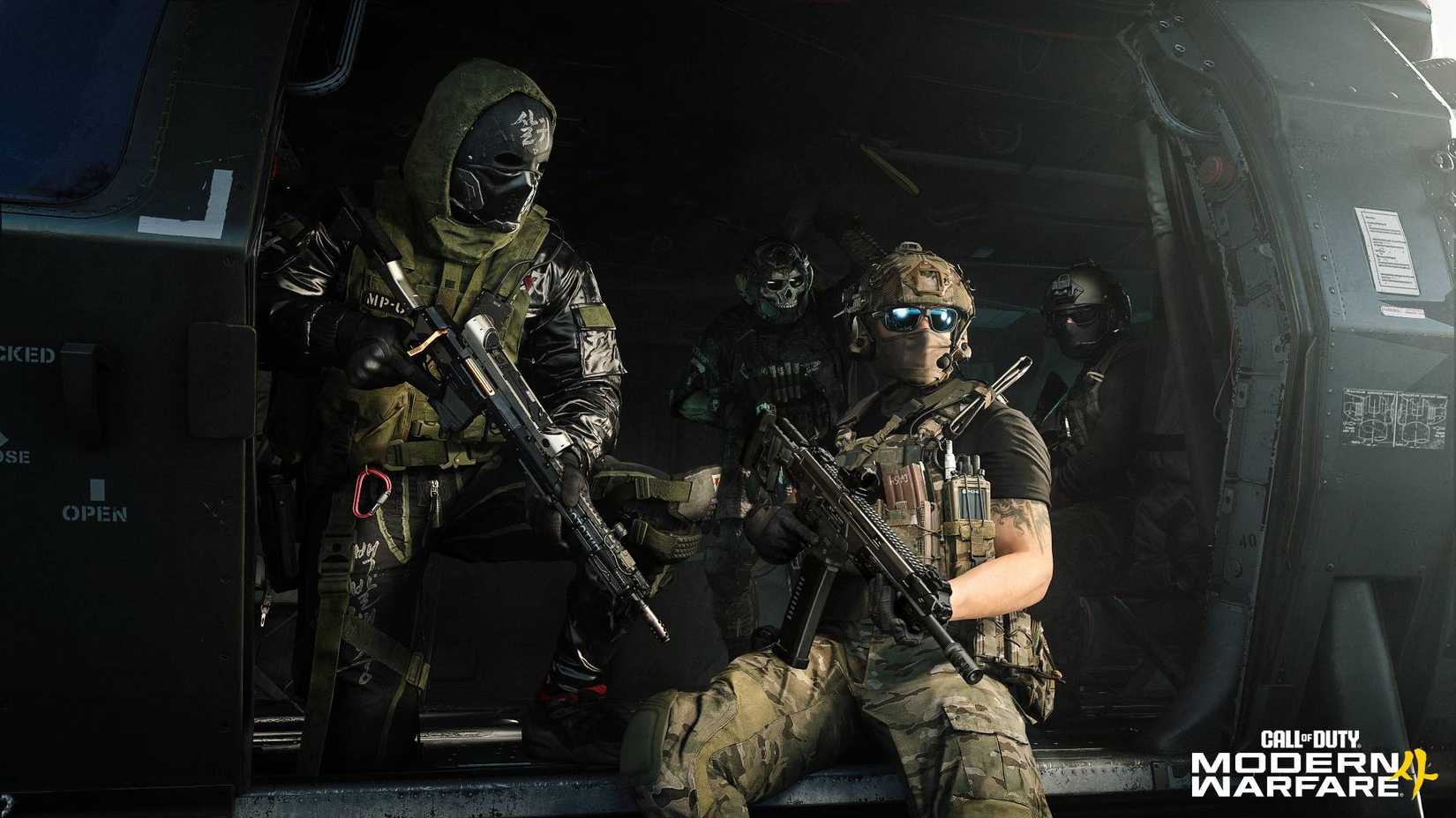 A squad of soldiers in Modern Warfare 4 sat in a helicopter.