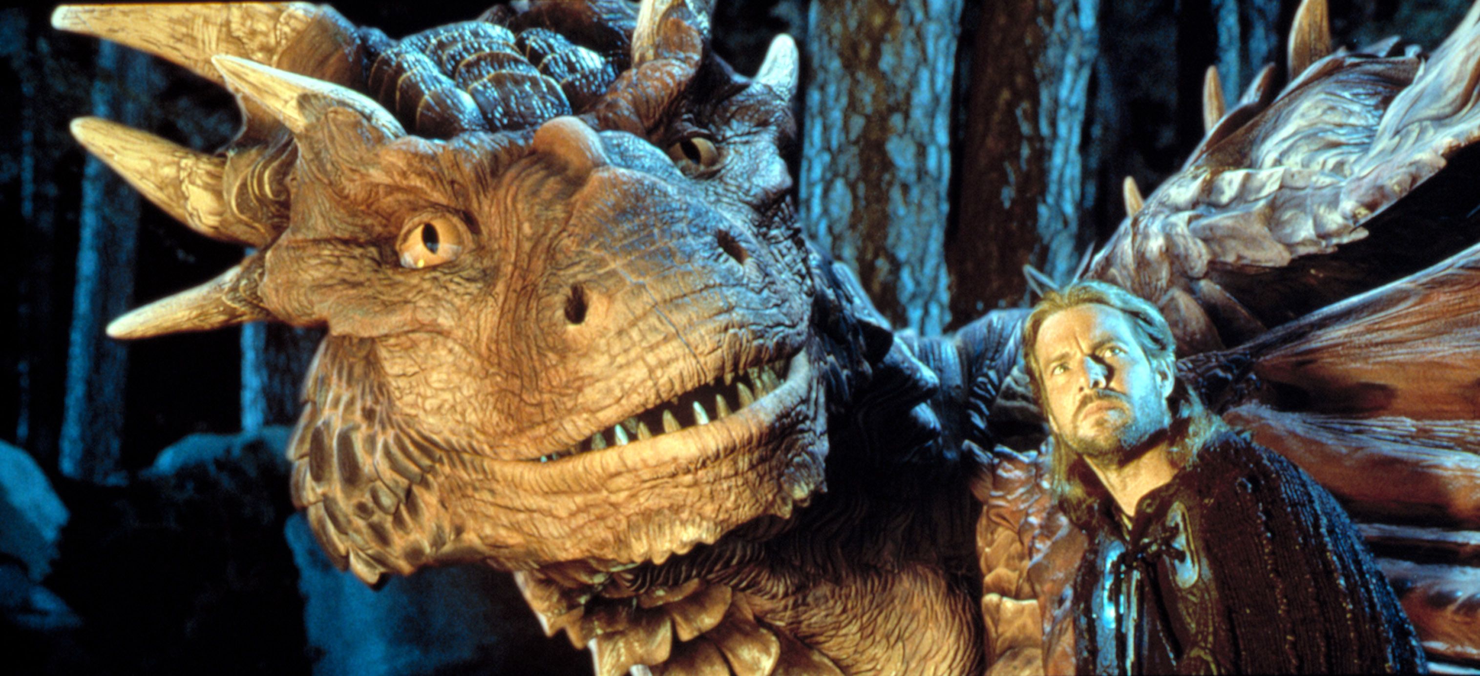 Draco the Dragon and Dennis Quaid as Bowen stare out into the distance.