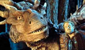 Draco the Dragon and Dennis Quaid as Bowen stare out into the distance.