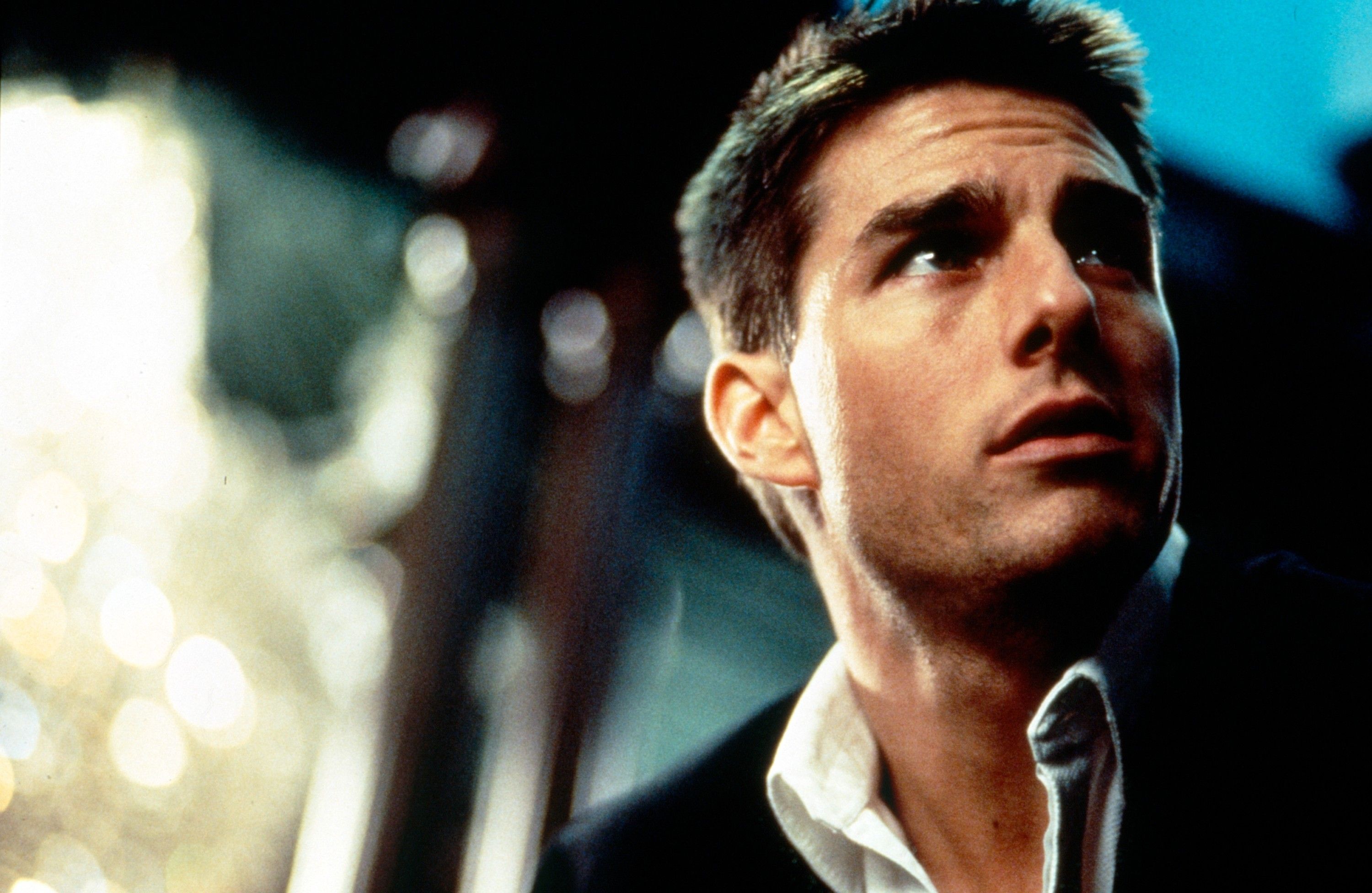 Tom Cruise looking up in contemplation