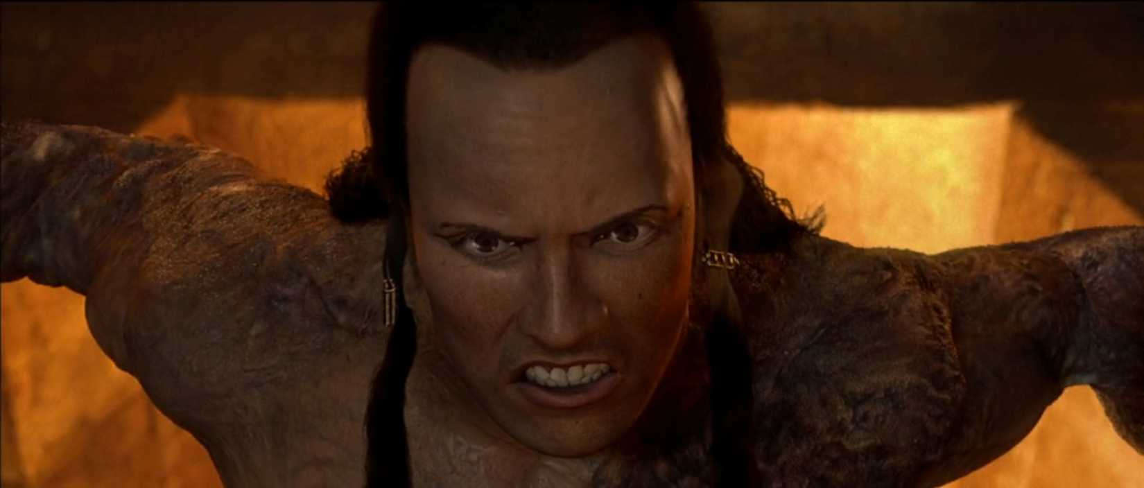 A close-up of the angry face of what is supposed to be Dwayne 