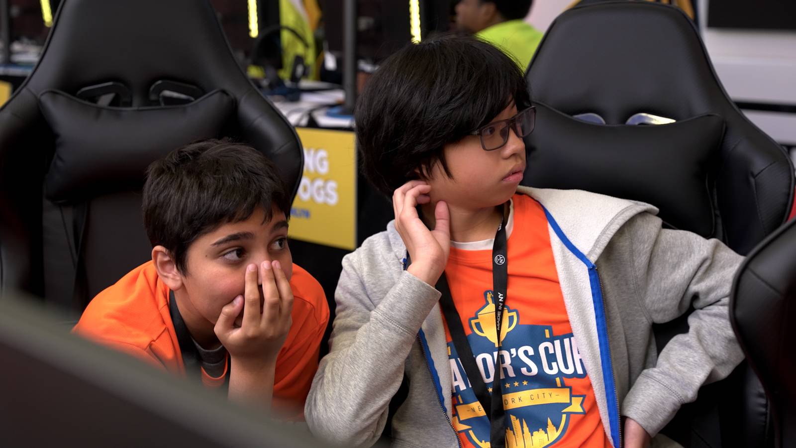 Two boys react to the results of a Minecraft competition