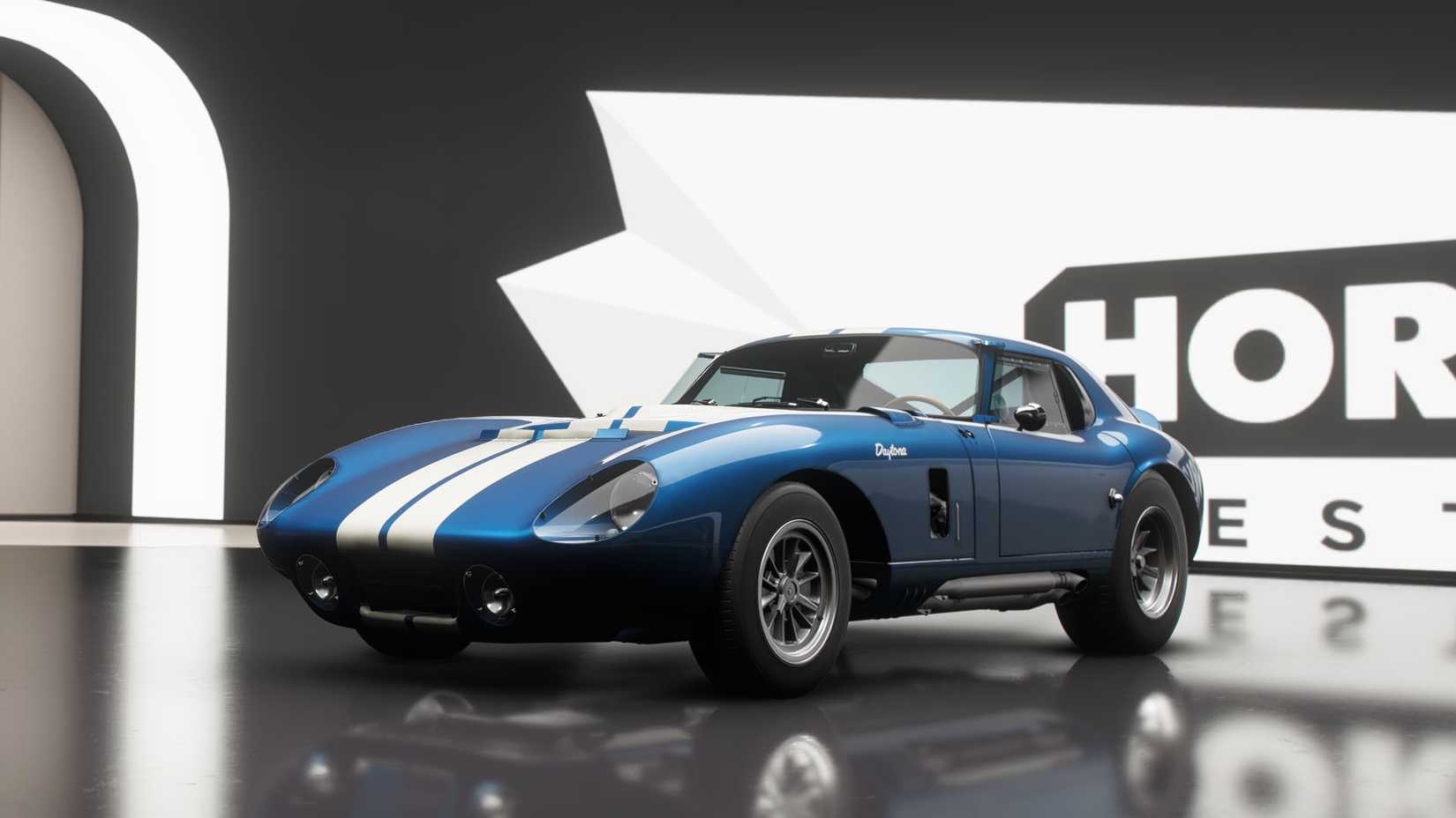 The Shelby Cobra Daytona Coupe, a blue sports car with white stripes, in Forza Horizon 6.