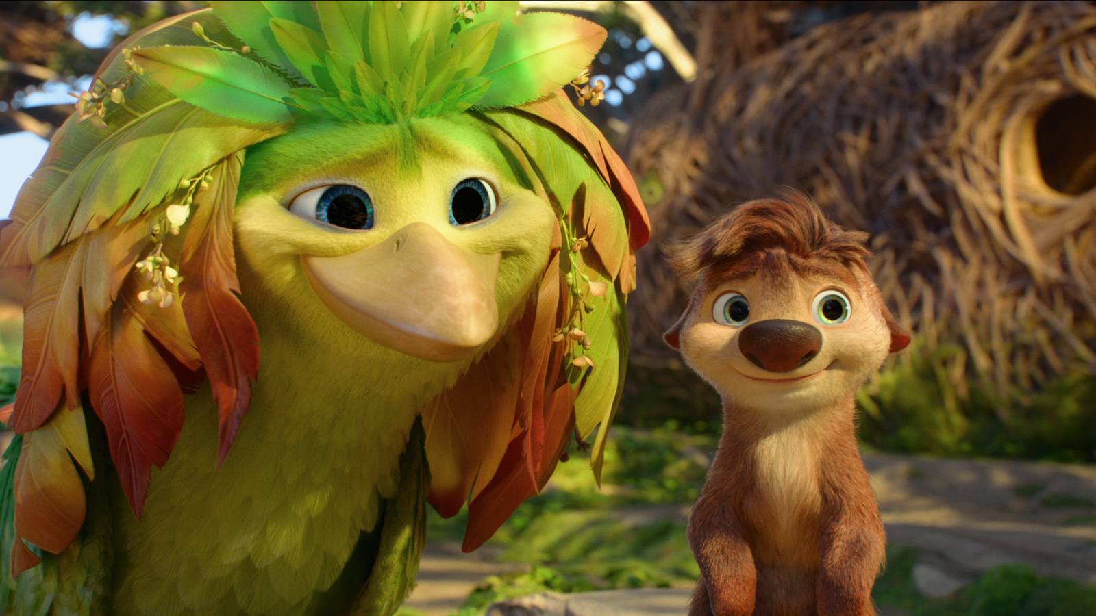 A green bird and a small mammal sit next to each other in a forest and look forward smiling in Swapped.