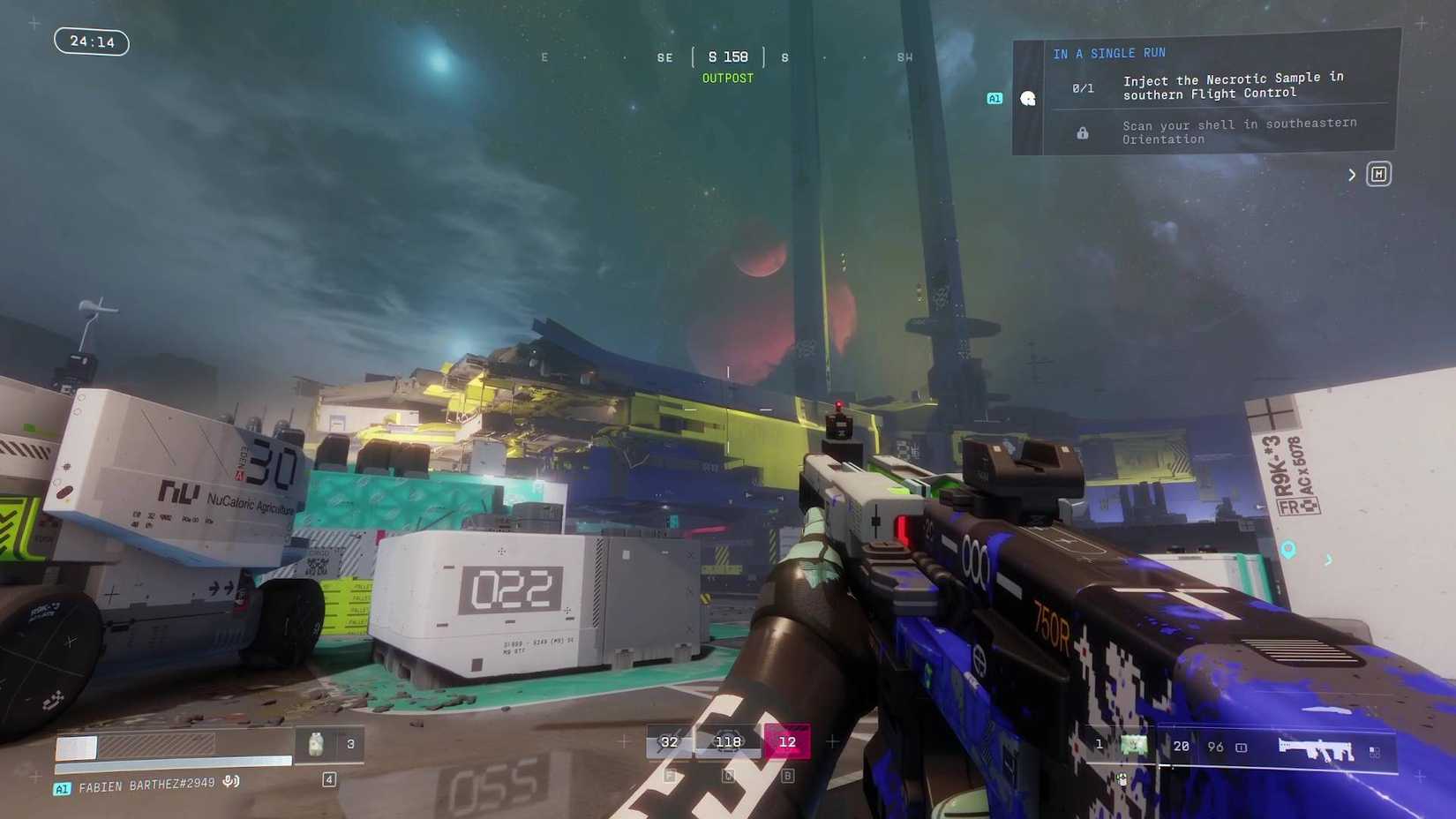The player holding an assault rifle and looking to the sky at the Tau Ceti system in Marathon.