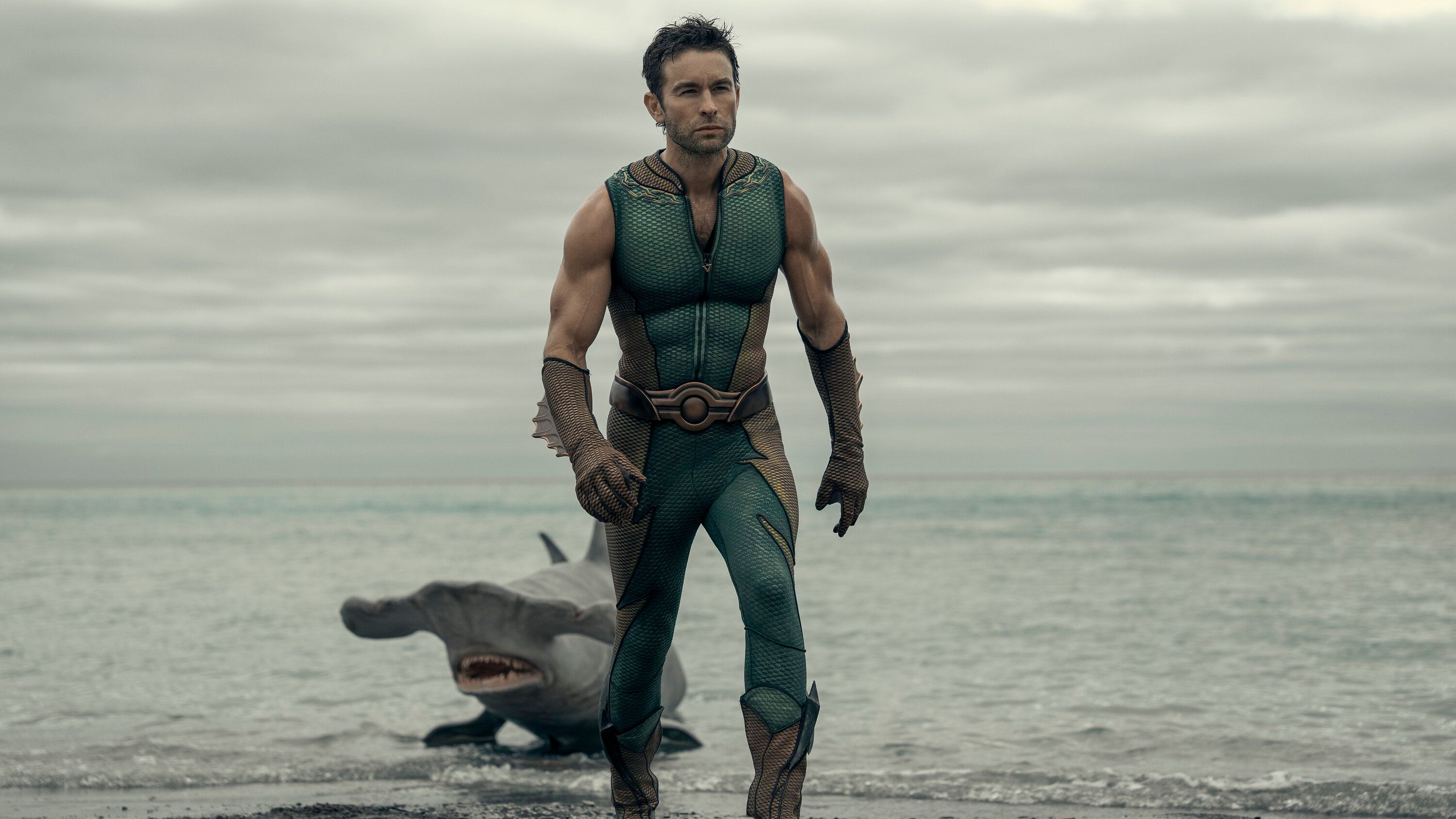 The Deep (Chace Crawford) steps out of the ocean with a hammerhead shark behind him in The Boys.