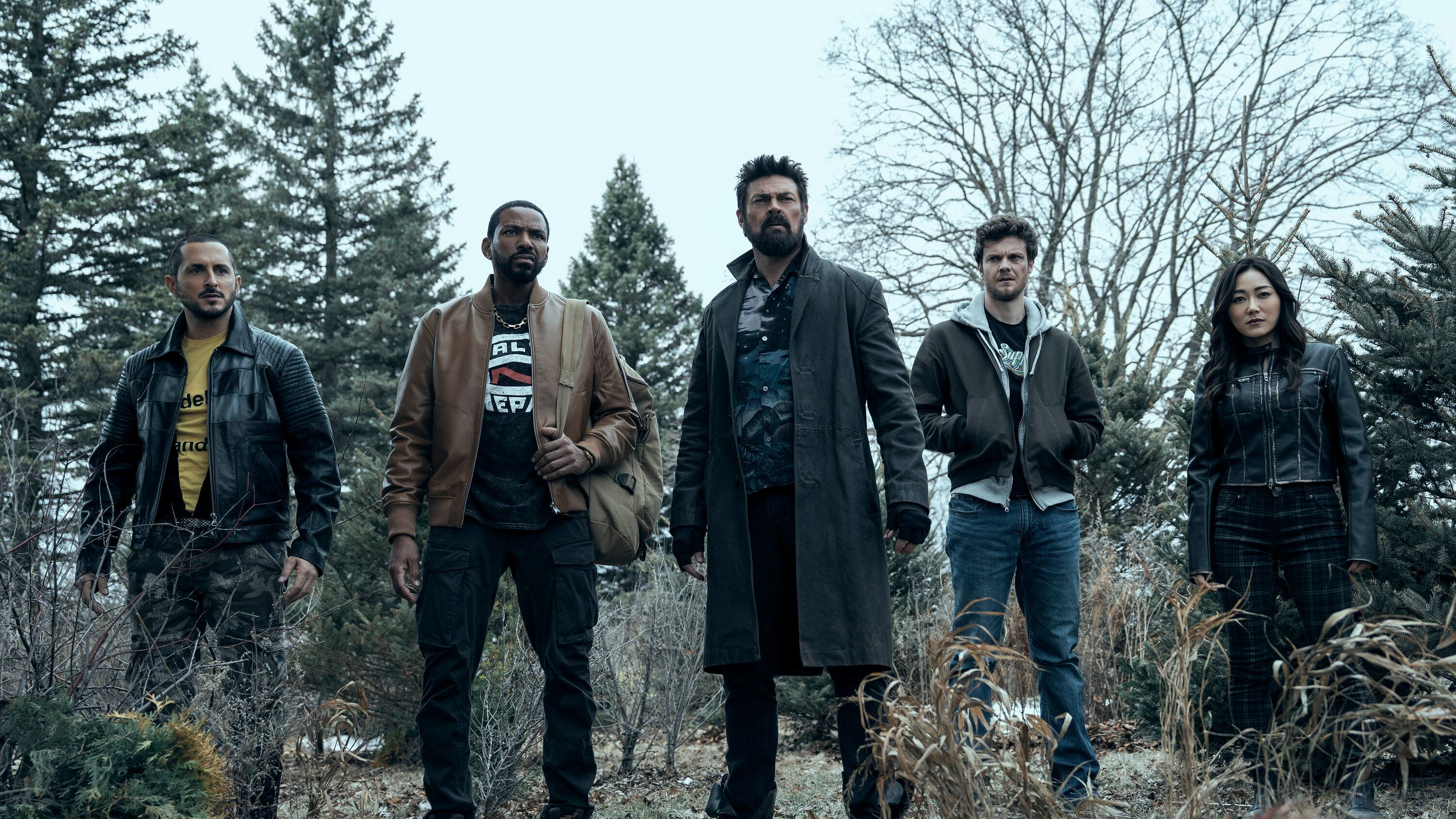 Frenchie (Tomer Capone), Mother's Milk (Laz Alonso), Billy Butcher (Karl Urban), Hughie Campbell (Jack Quaid), and Kimiko (Karen Fukuhara) stand in the woods in The Boys season 5, episode 4.