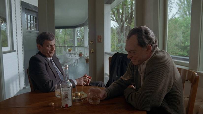 Bill Mulder and the Cigarette Smoking Man share a drink