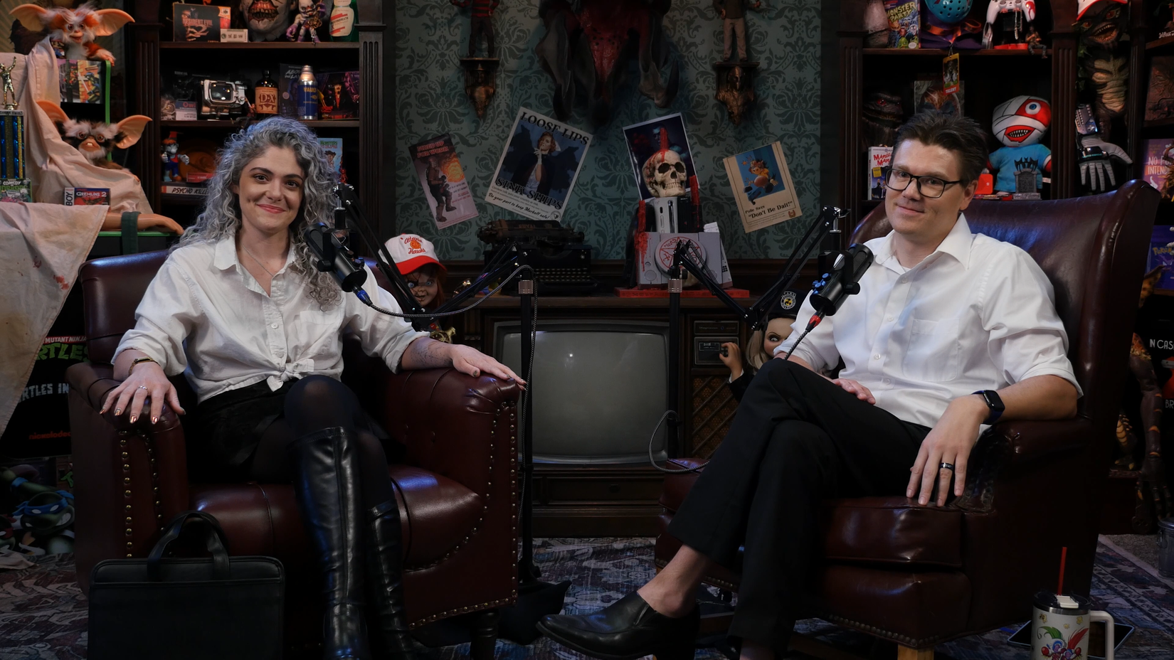 An image featuring Zoran and Gina from their podcast talk show, What We Play in the Shadows.
