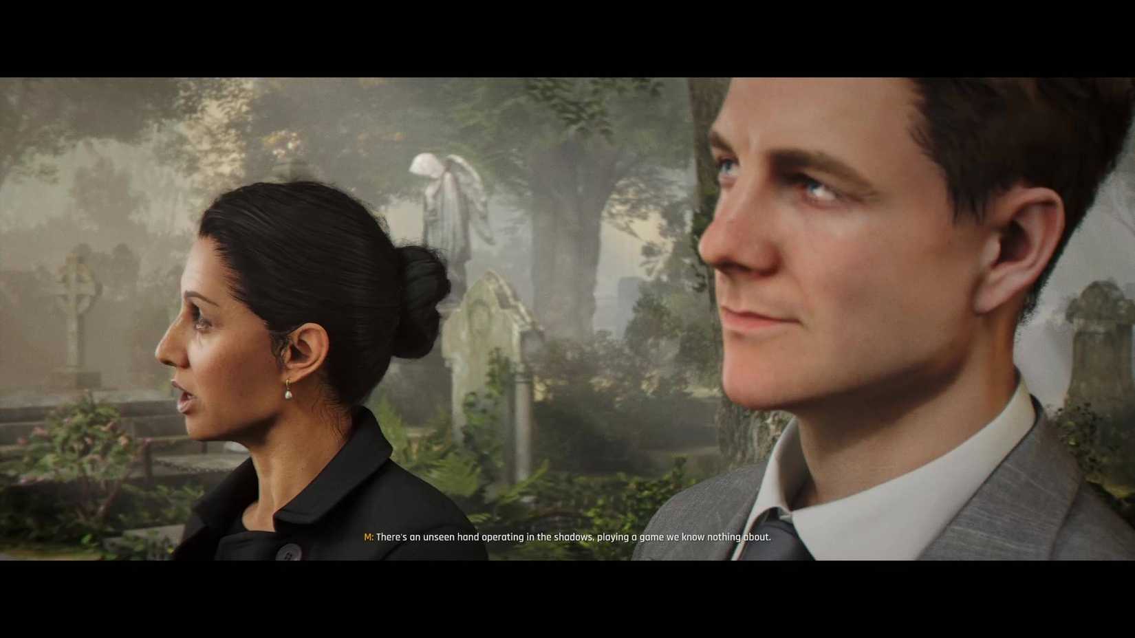 James Bond and M talking at Greenway's grave.