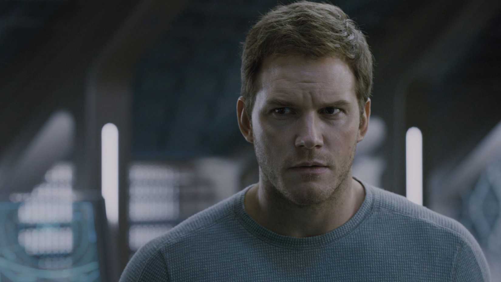 Chris Pratt looks perturbed with a sci-fi like background behind him.