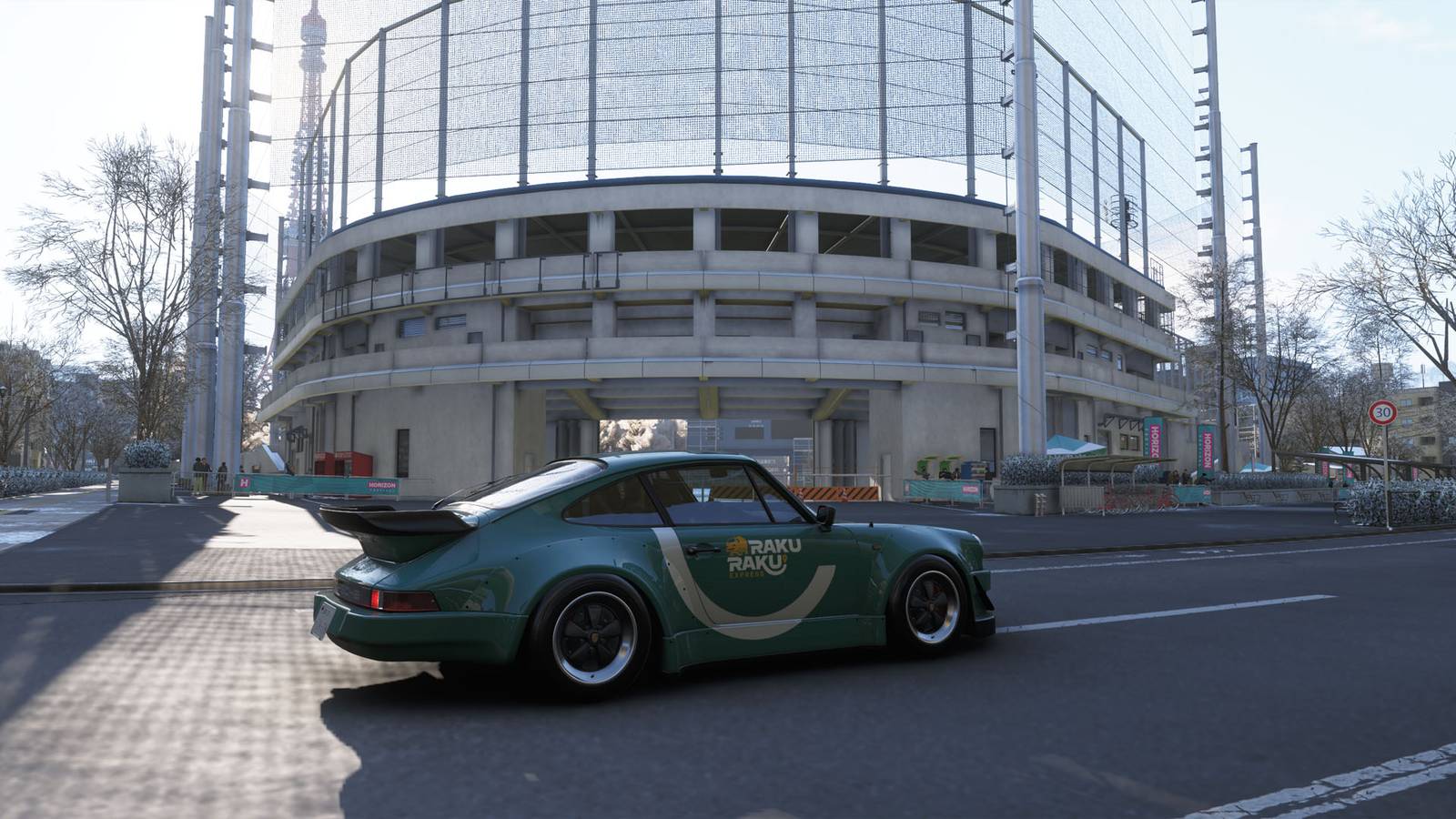 A blue-green Porsche sitting in front of a baseball stadium in Forza Horizon 6.