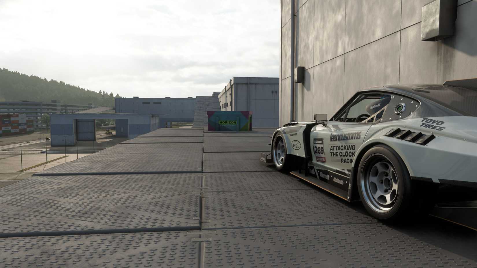 A Forza Horizon 6 screenshot showing a car in front of the treasure hunt box