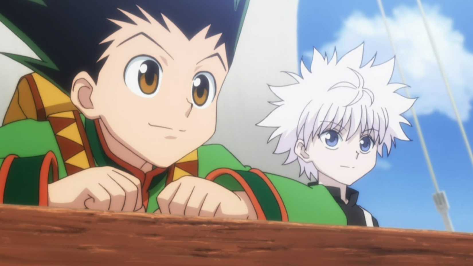 Gon and Killua looking out at the sea from the port of a ship.