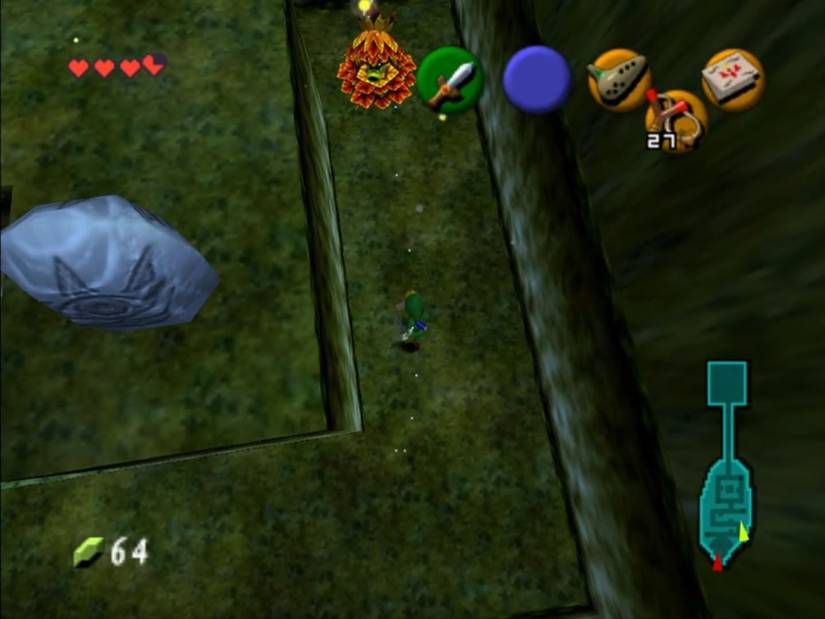 Link in a tight corridor in a maze with a monster covered in orange leaves in Ocarina of Time.