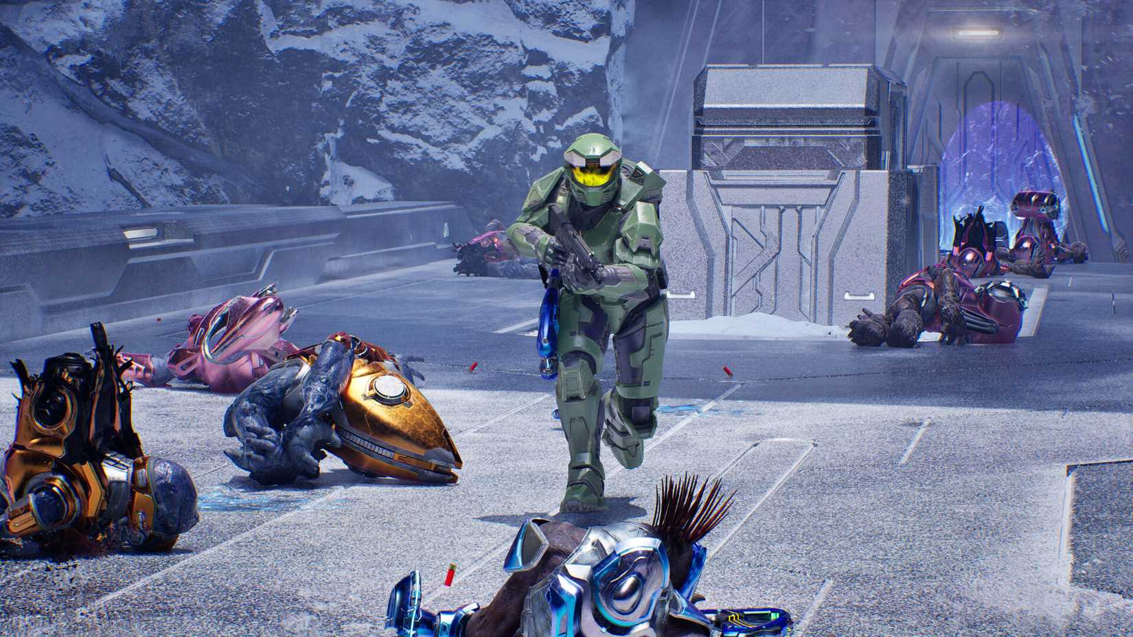 Master Chief runs down a bridge in Halo Campaign Evolved