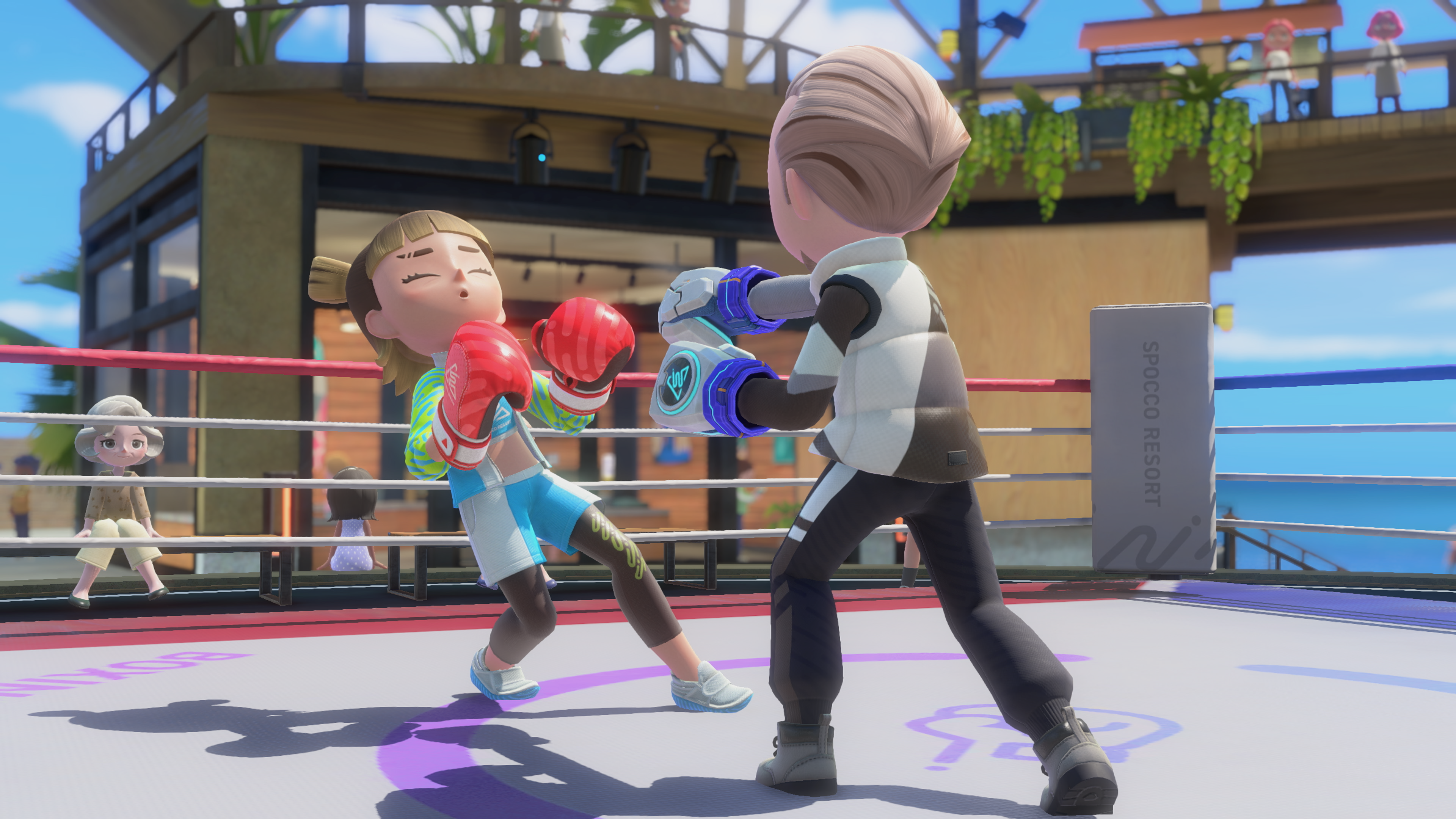A Mii lands a punch on another in Switch Sports boxing