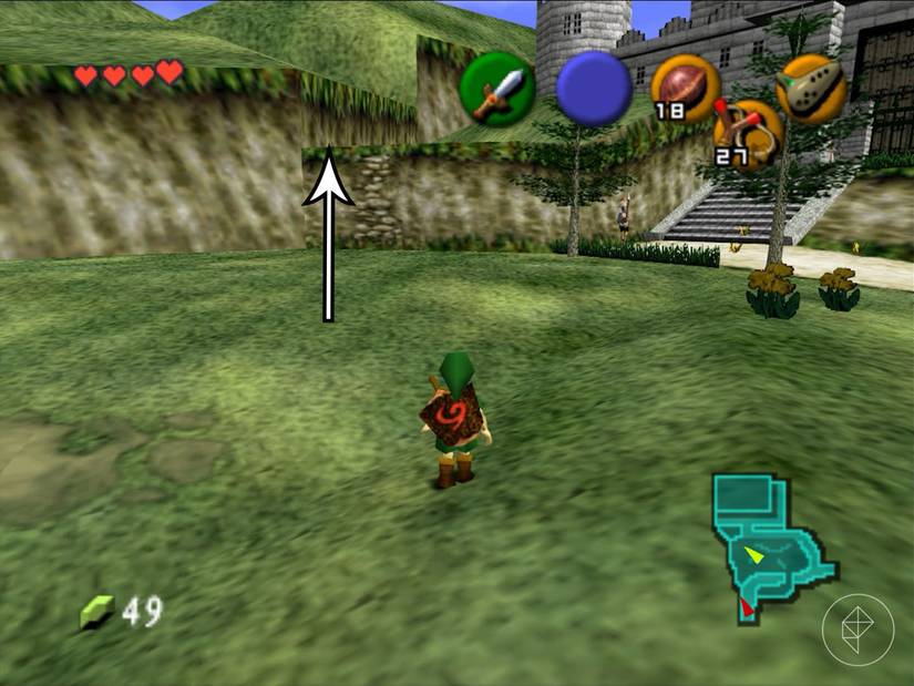 Link standing in a grassy area in front of a rocky wall in Ocarina of Time.