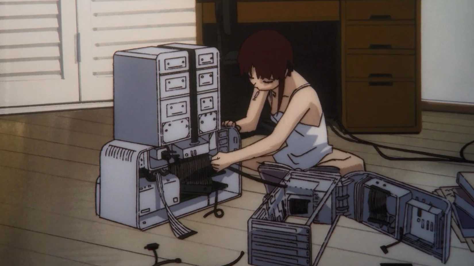 Shot from Serial Experiments Lain of Lain building her NAVI