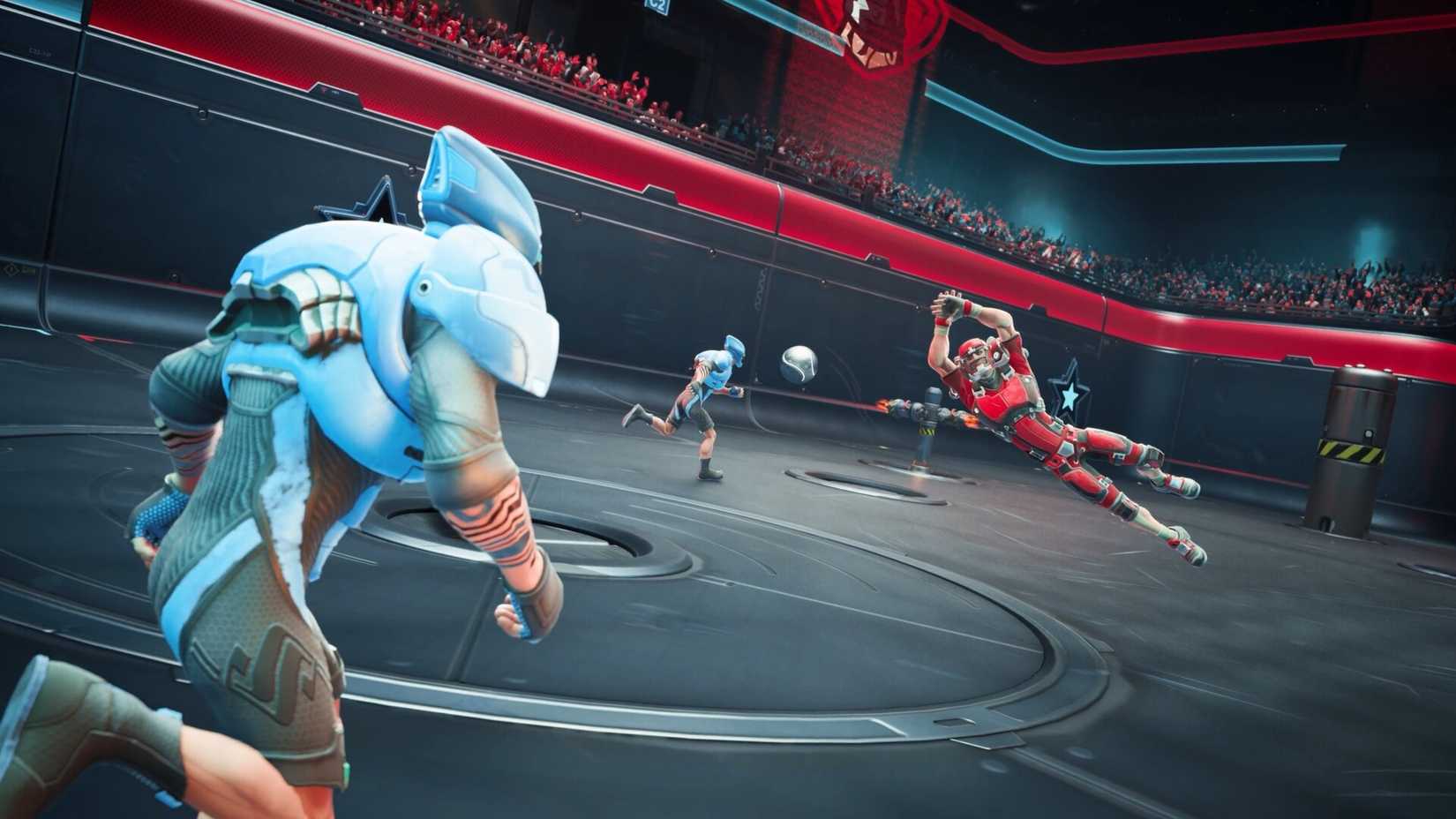 A speedball athlete making an impressive diving grab.