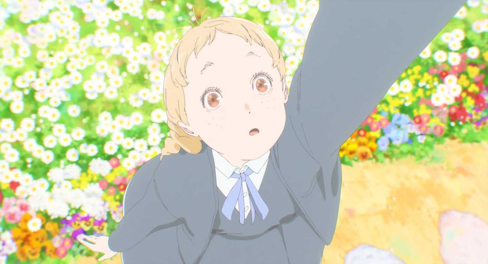 Totsuko looks up with a wide-eyed expressions as flowers surround her in The Colors Within