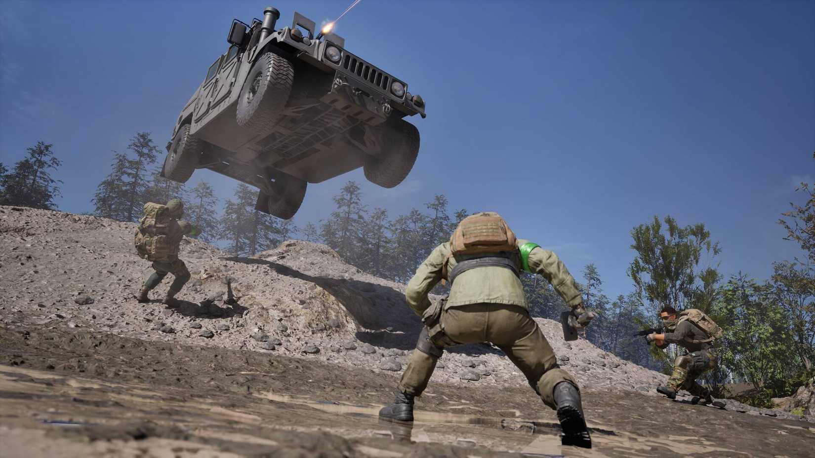 A 4x4 humvbee jumping over a pile of rubble with three soldiers beneath it in Wardogs.