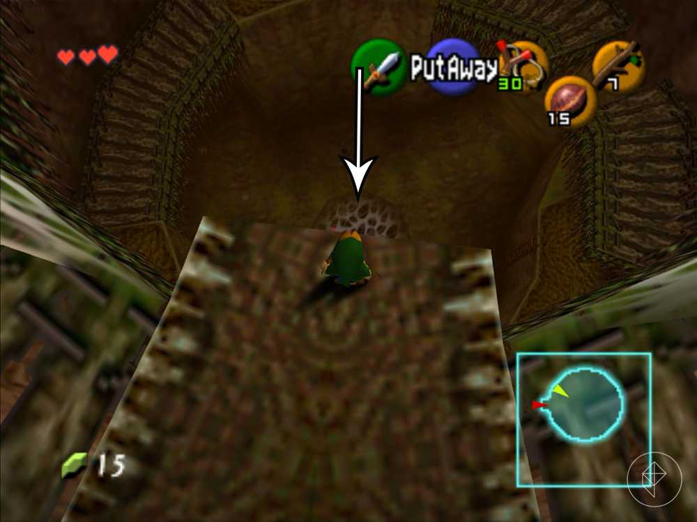 Link na borda de uma plataforma olhando para uma abertura coberta por teia em Ocarina of Time.