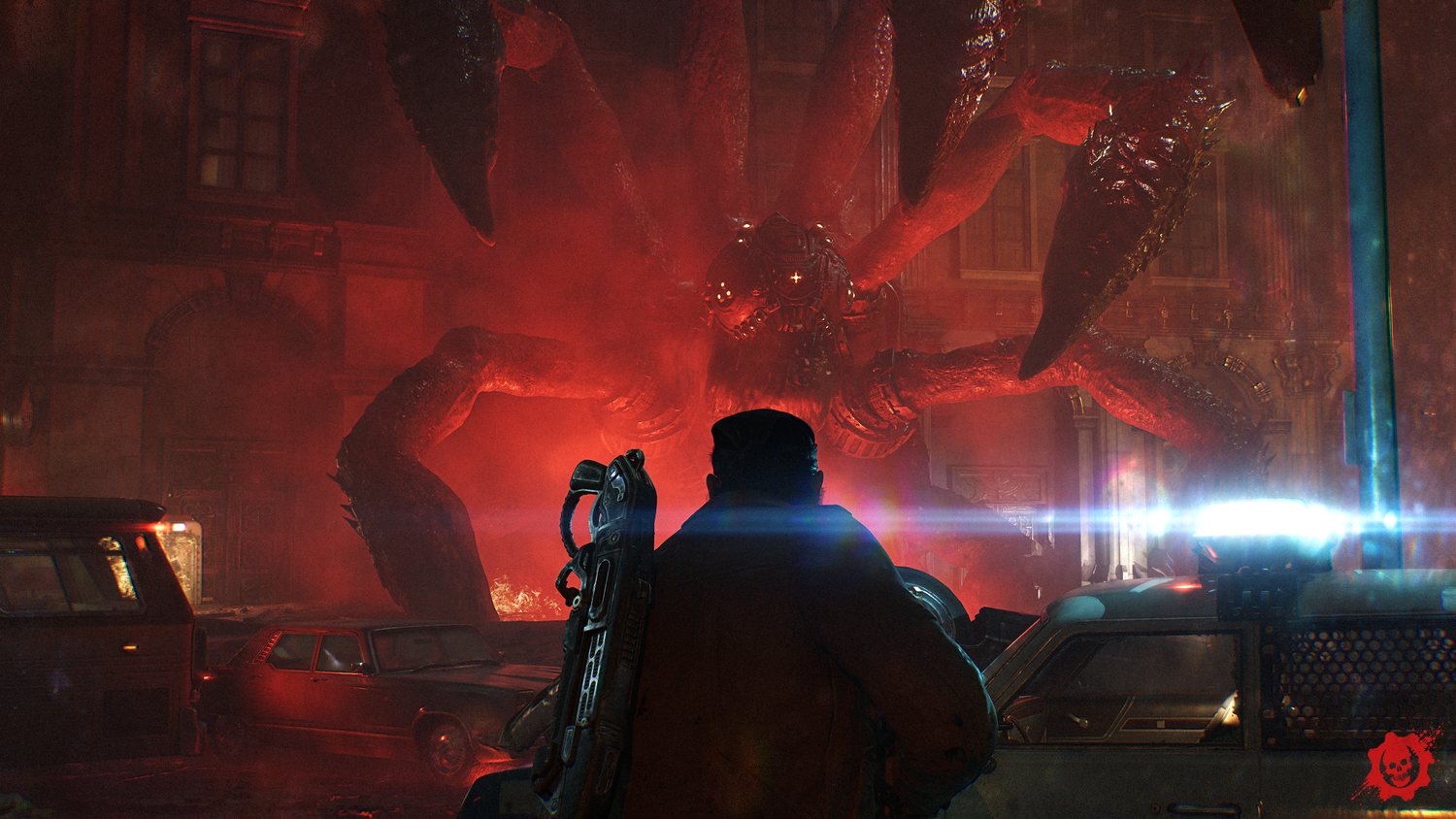 A big spider thing emerges from a sinkhole in Gears of War E-Day